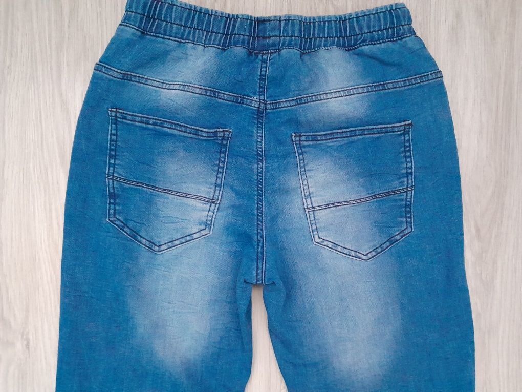 Spodnie jeansowe w gumkę Reserved 170 cm