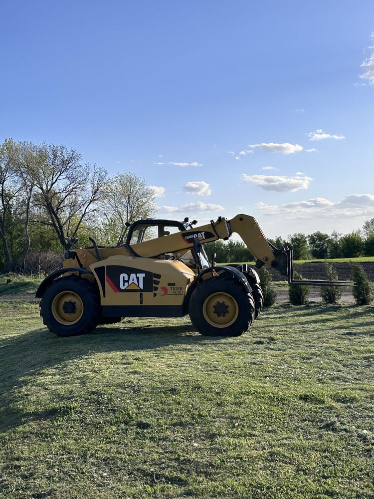 Телескопічний навантажувач JCB Manitou CAT TH 406 manitou