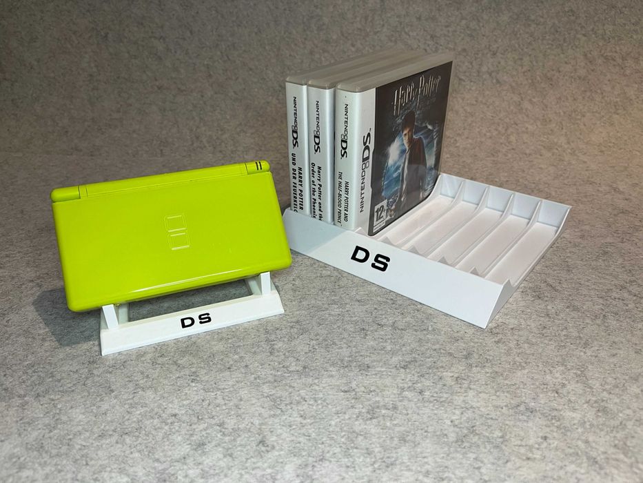 Zestaw stojakow na 8 gier oraz konsole Nintendo DS
