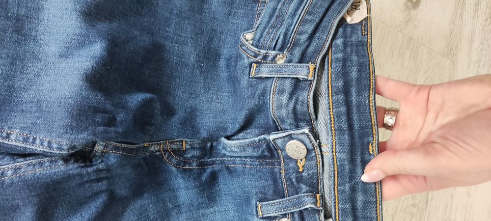 Spodnie jeansy Lee, rozmiar W28, L31.