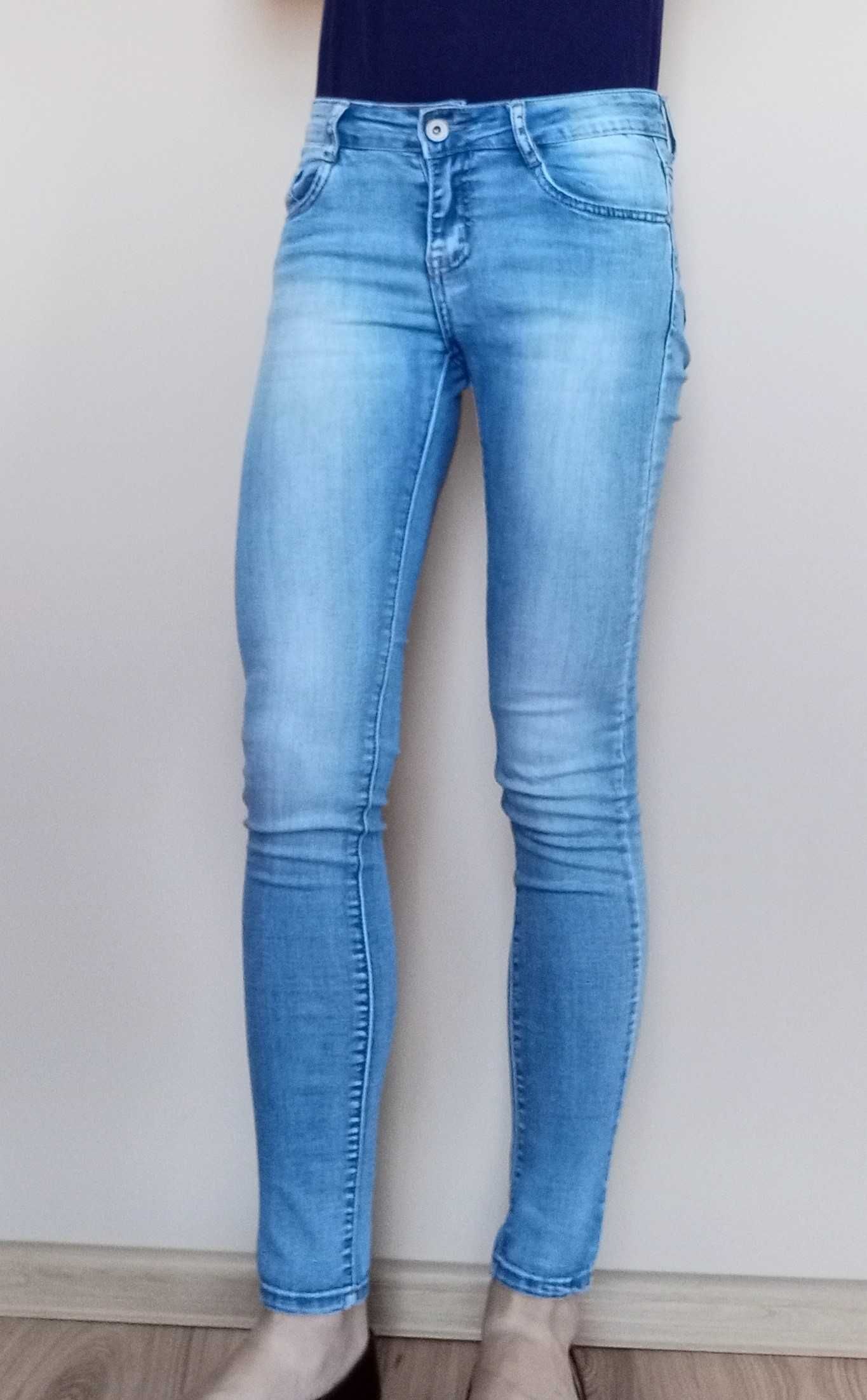 Skinny jeans 26 jasnoniebieskie z efektem sprania