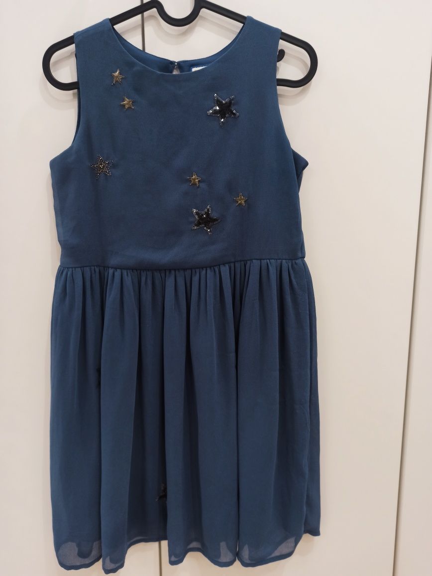 Granatowa sukienka z gwiazdkami. 146-152