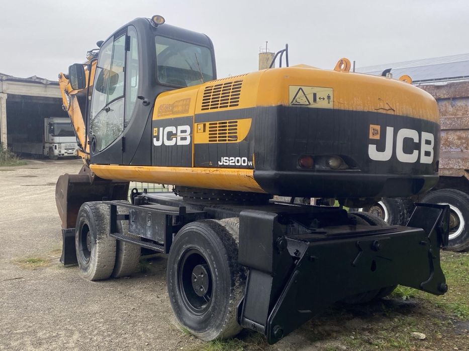 Екскаватор JCB js200w ( 23 тони і решта в описі)