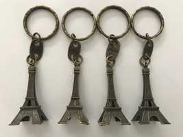 Breloczki z Wieżą Eiffla komplet 4 sztuki pamiątka Paryż Francja