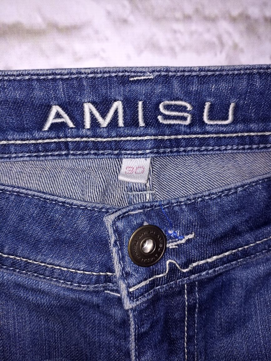 Amisu kultowe spodnie jeansowe z dziurami, cekiny R.L 40