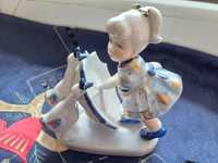 Porcelanowa sliczna figurka dziewczynka z parasolka i gaskami-vintage