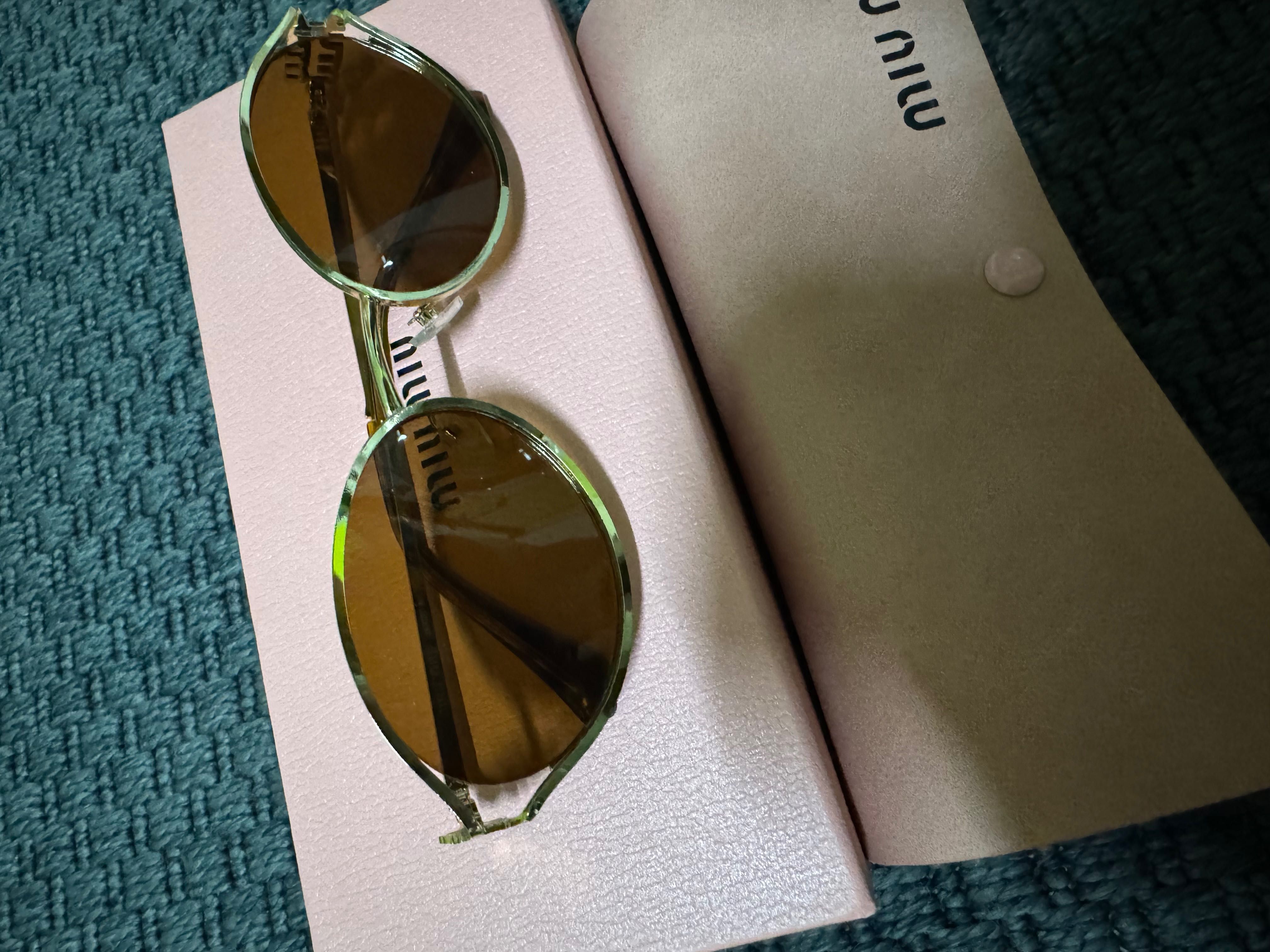 Óculos de sol  miu miu