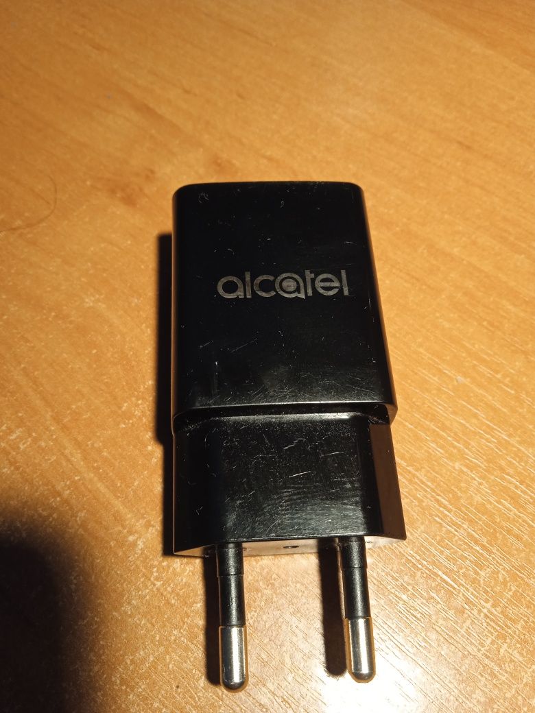 Зарядий пристрій alcatel