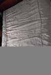 Colcha beige com textura da marca "Renaitex"