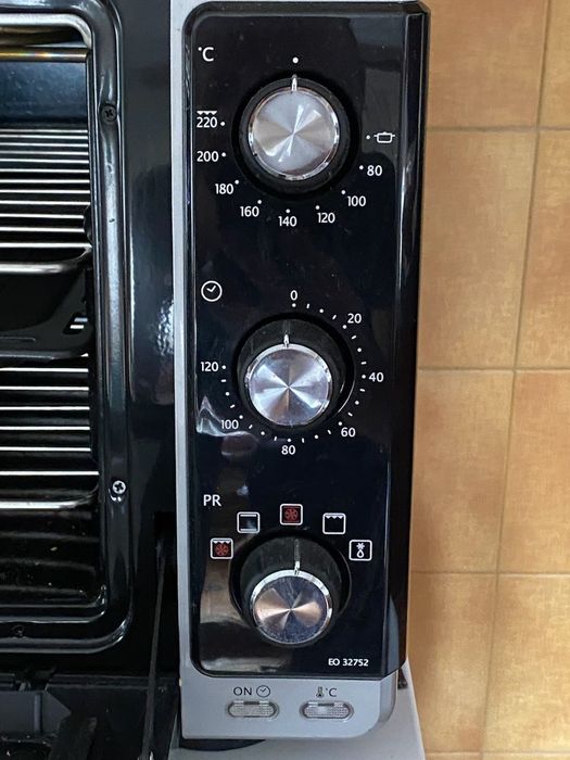 Forno portátil DeLonghi Maxi