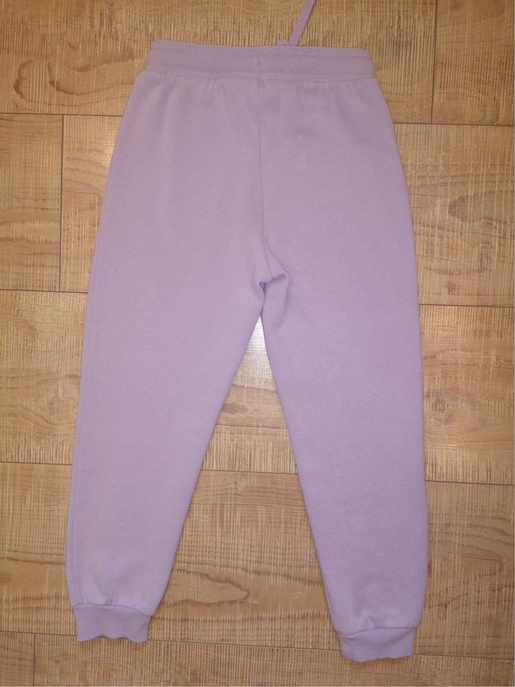 Spodnie dresowe dla dziewczynki fioletowe roz. 116 H&M