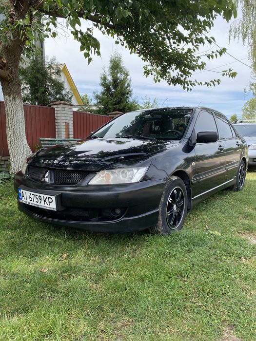 Mitsubishi Lancer 9 • 1.6 бензин/ГБО • АКПП • клімат • титани