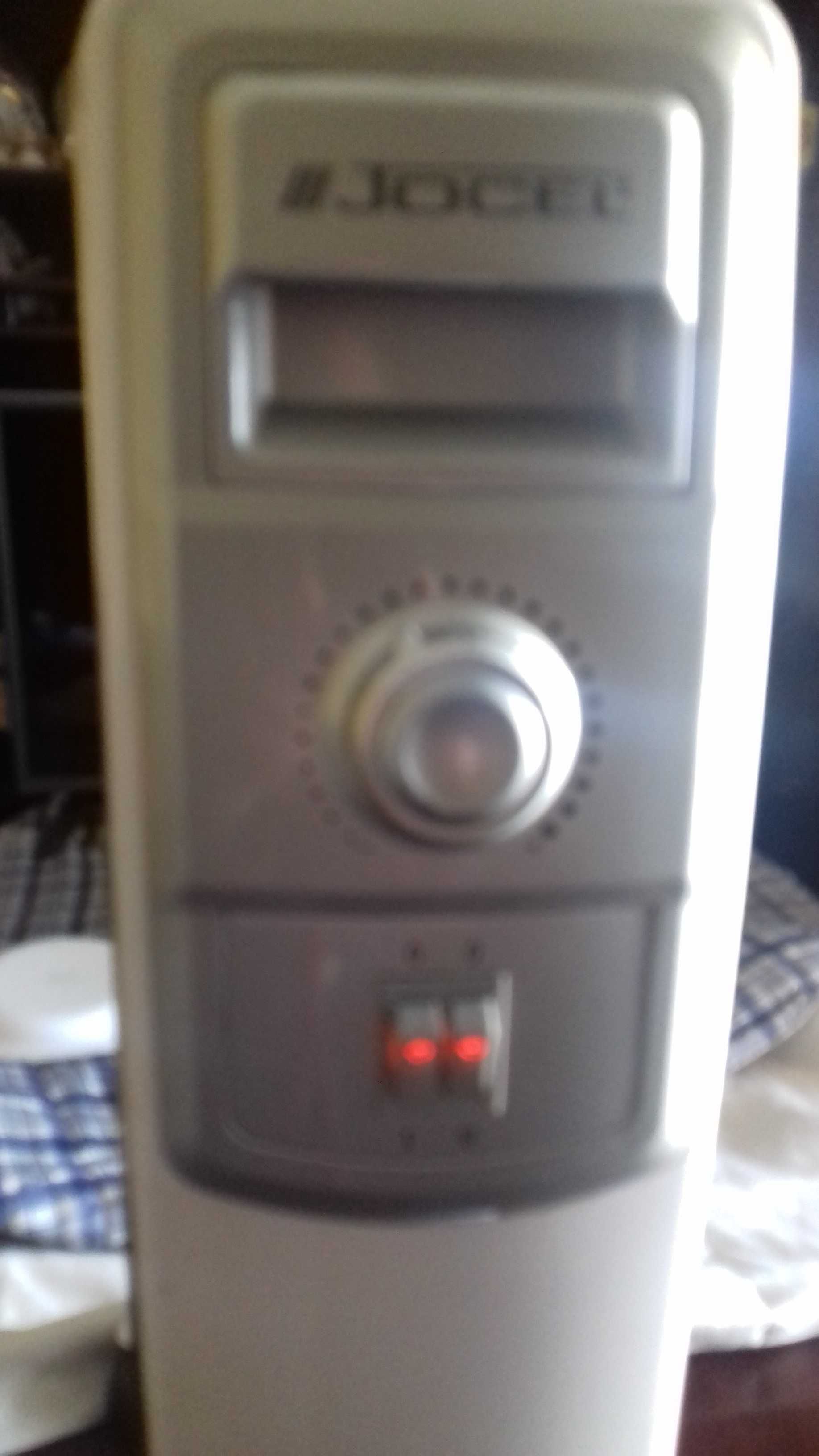 vendo aquecedor a óleo marca jocel 2000w a funcionar