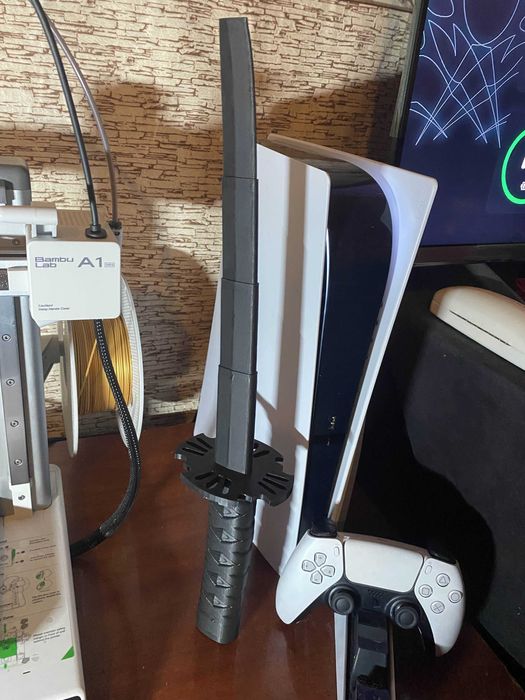 Катана iграшкова, "лезо" можна скласти у ручку.