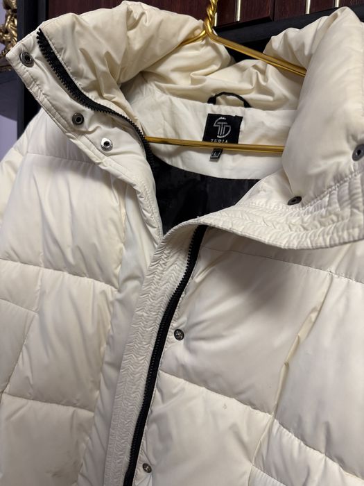 Молочний пуховик