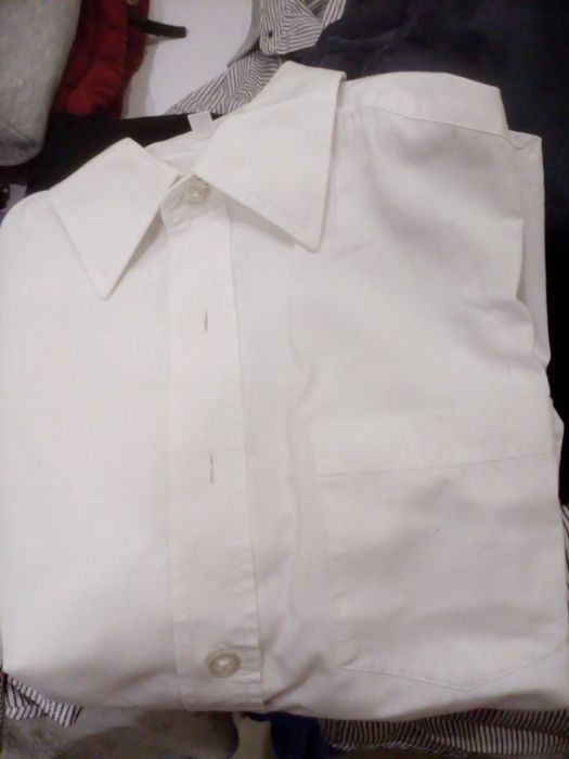 Biała koszula chłopięca z długim rękawem r.134