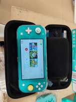 Nintendo Switch Litte + gry Animal Crossing, Smerfy i Mario
