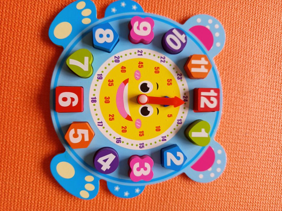 Дитячий годинник сортер
