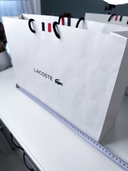 Torba Lacoste papierowa siatka logowana biała duża ozdobna pojemma