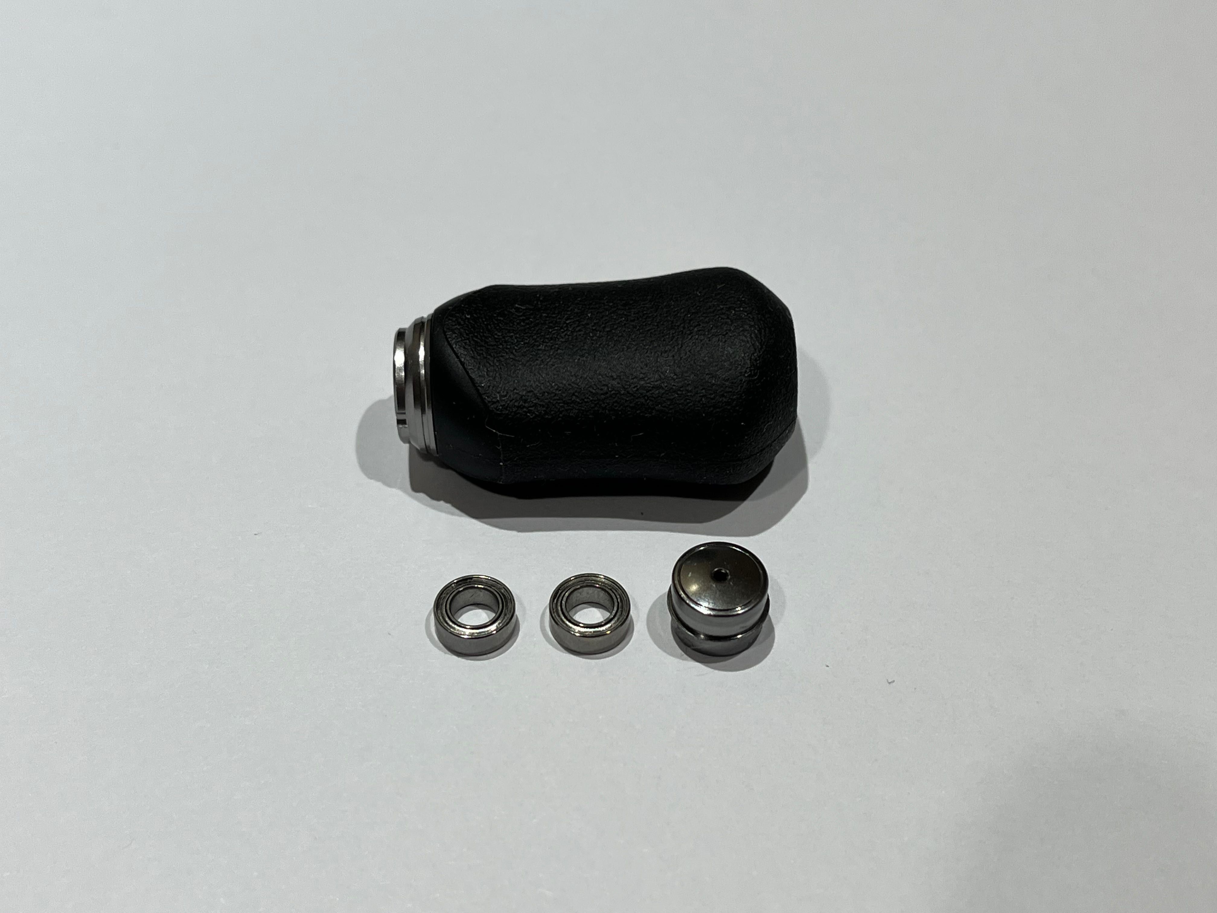 NOWY mocny japoński knob Shimano z 2 nowymi łożyskami do Stelli,TP itp