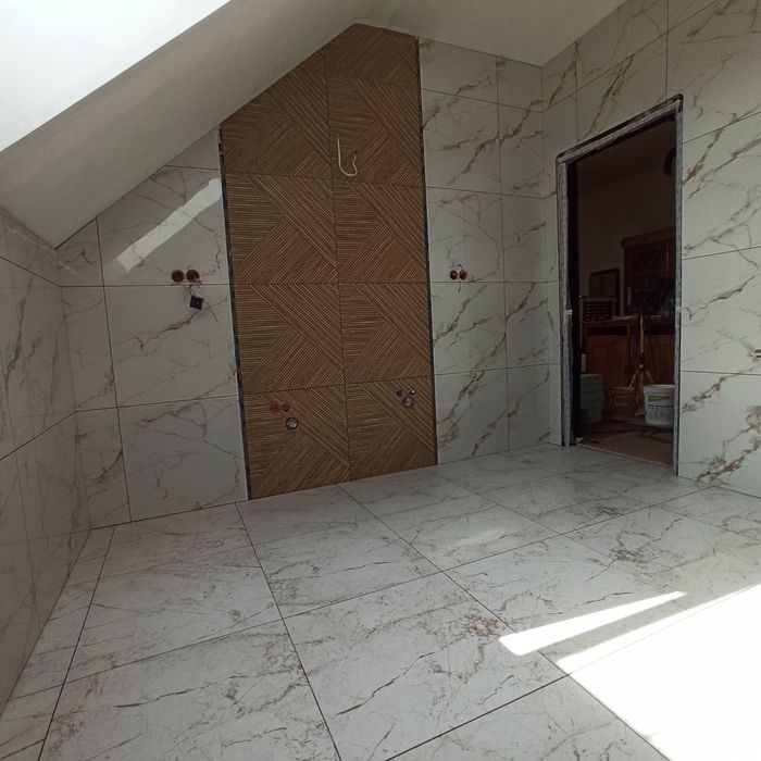 Łazienki Układanie płytek Remonty Wykończenia Gładzie Malowanie