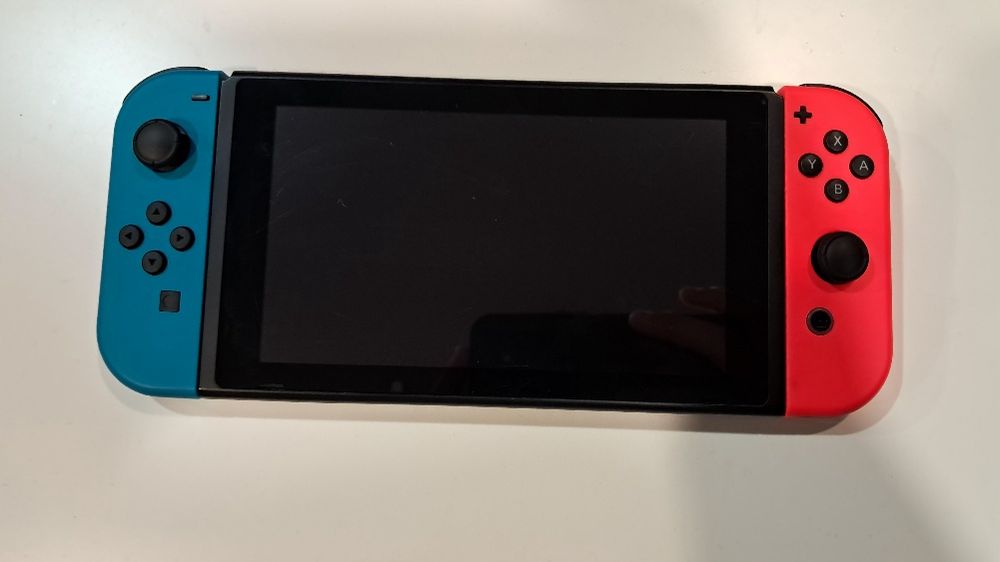 Nintendo switch e 2 jogos