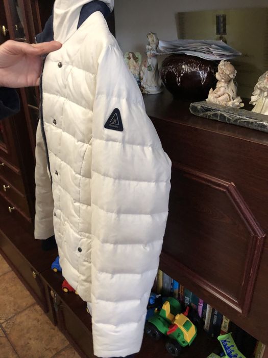 Жіноча фірмова куртка