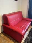 Sofa w zestawie z pufą