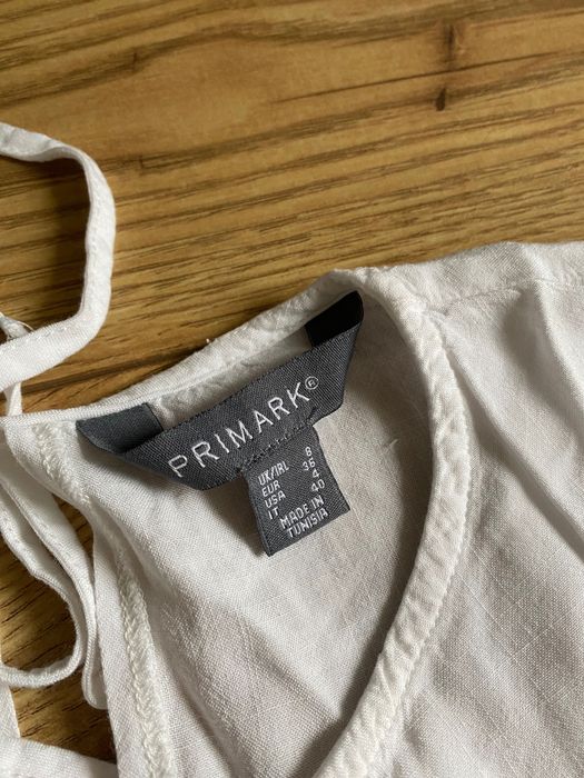 Biala elegancka bluzka z baskinką