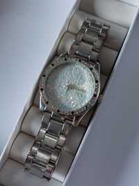 Srebrny zegarek na bransolecie