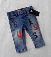 Spodnie Jeansy Guess wiek 3-6 m-ce niebieski