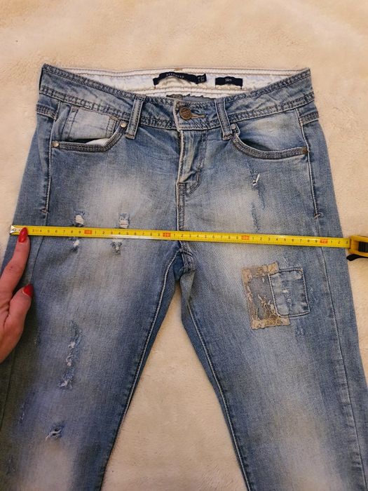 Spodnie dżinsy przetarcia Reserved W27 L32