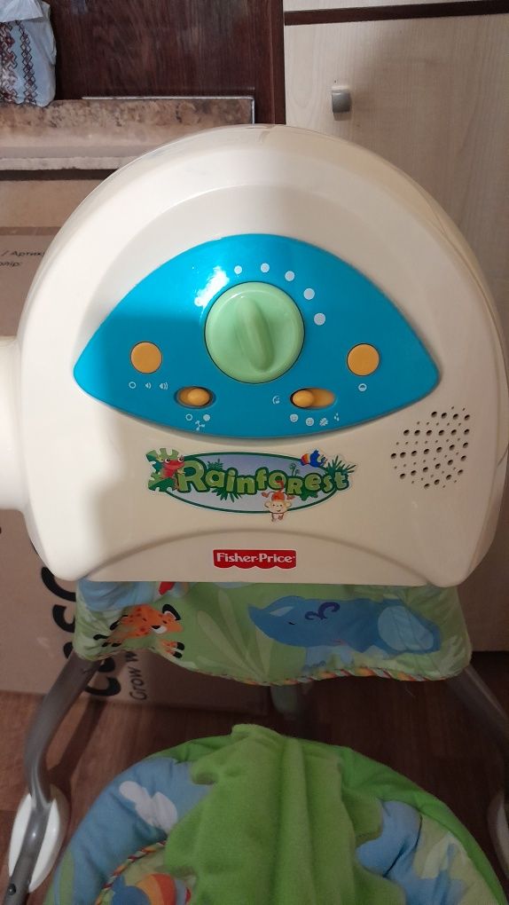 Гойдалка.Закачувальний центр Fisher price