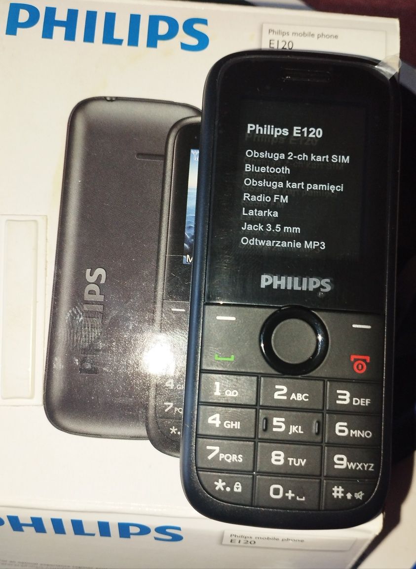 Nowy telefon Philips E120, folia , pudełko, słuchawki ,nowa bateria