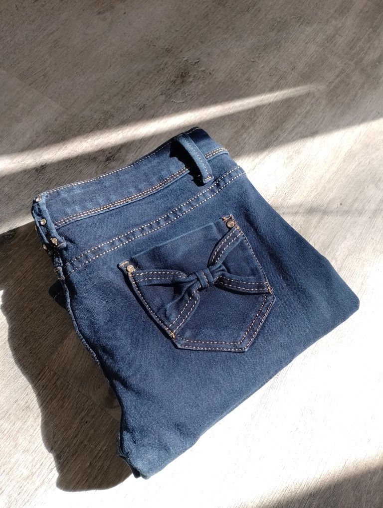 Spodnie jeansowe z elastanem 42