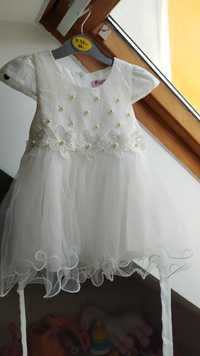 Biała elegancka sukieneczka