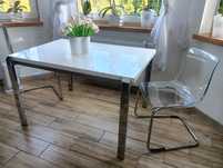 dwa krzesła transparentne. Ikea chromowane