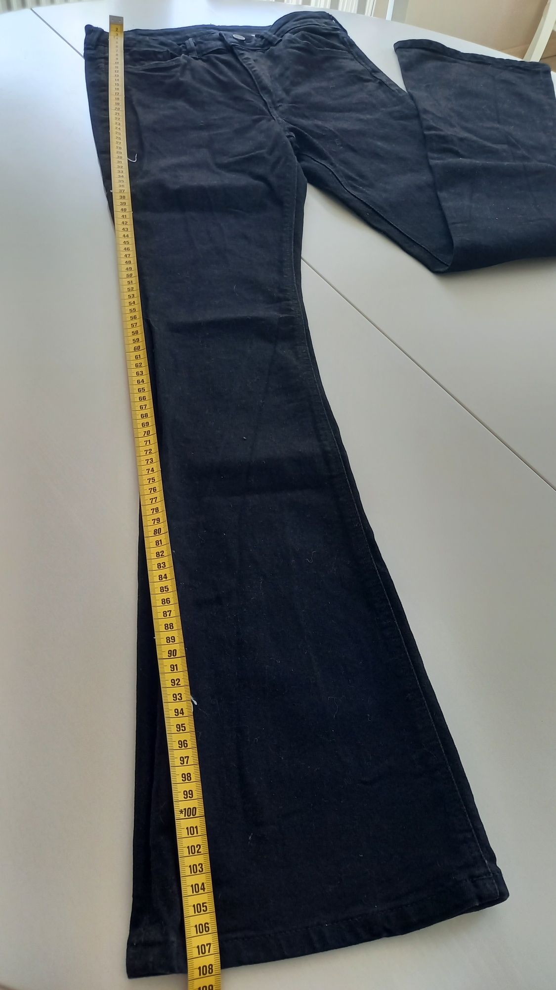 Spodnie jeans czarny H&M wysoki stan, rozszerzana nogawka