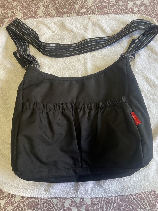 Baby diaper bag in black colour.
