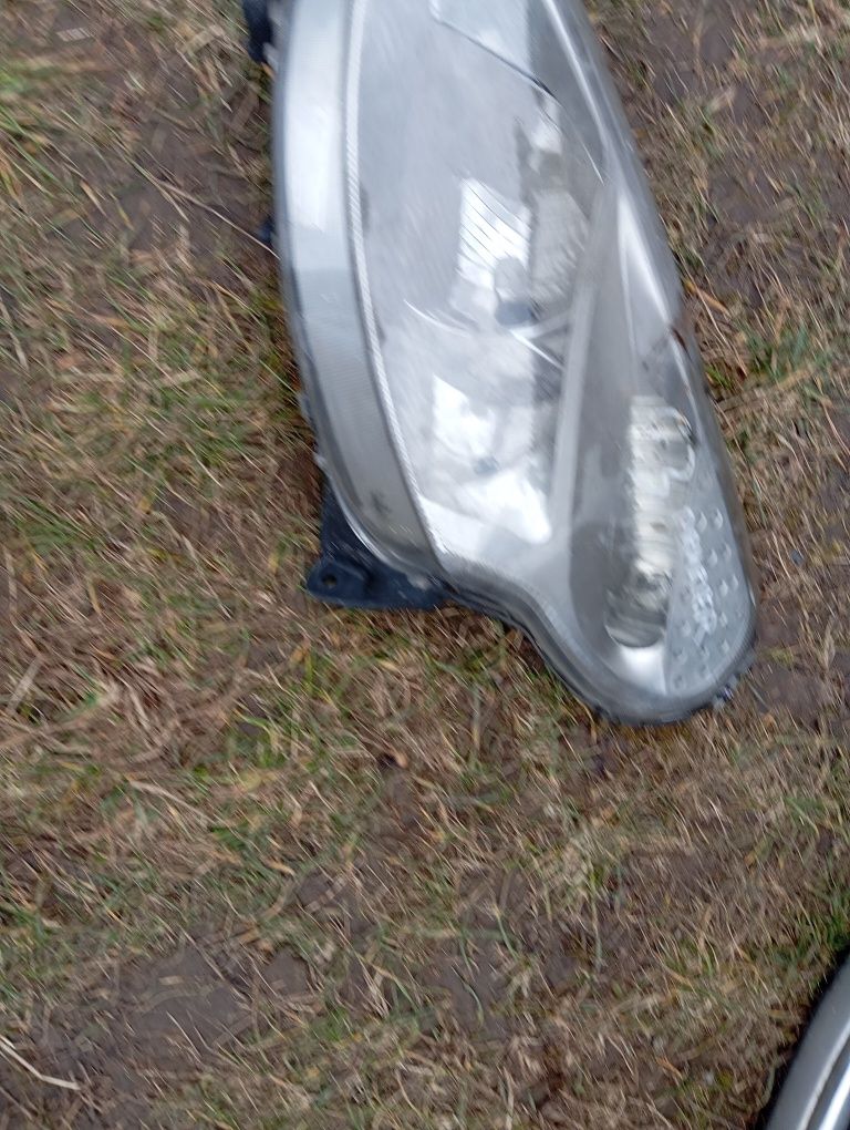Lampa reflektor lewy przód Citroen C3 Plurier Oryginał Europa