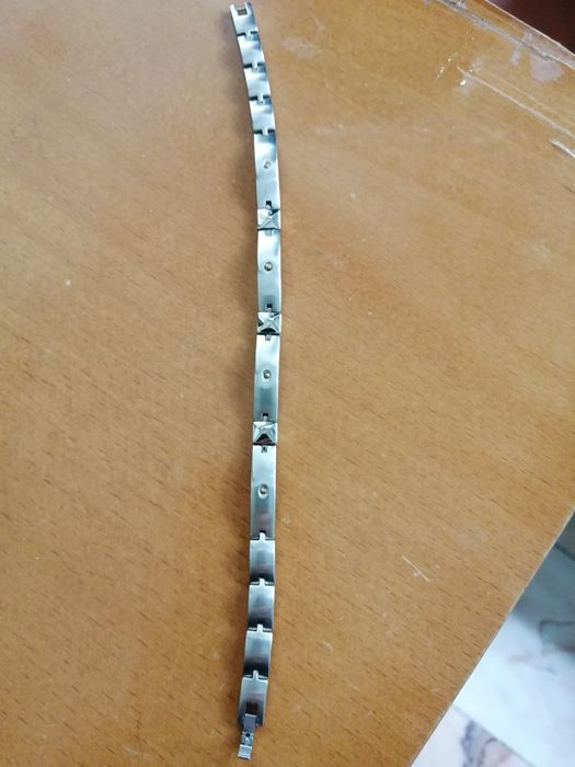 Anéis e pulseira em aco