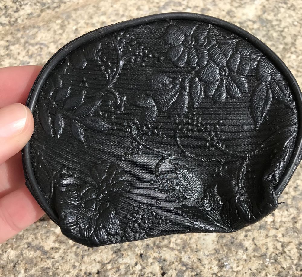 Pequena bolsa de moedas