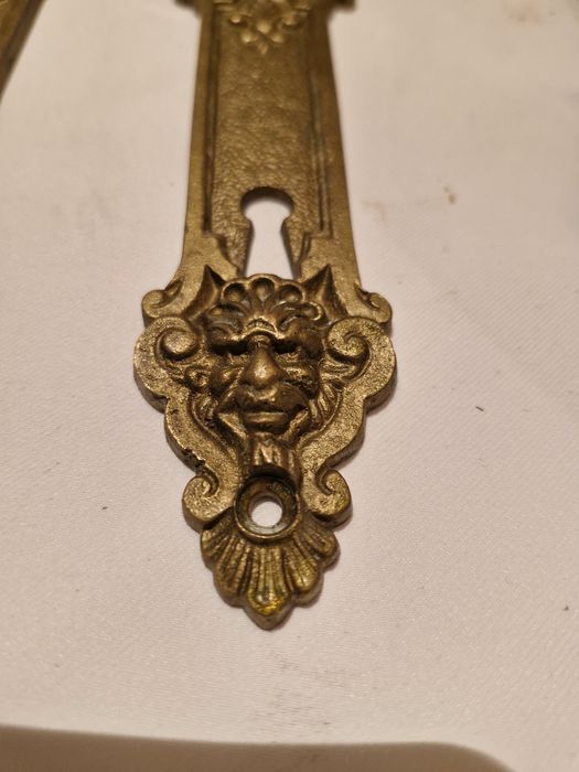 Klamki mosiężne komplet