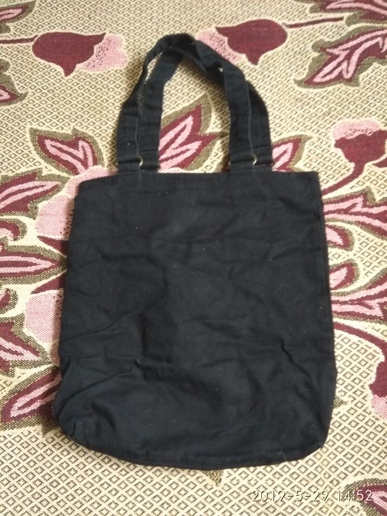Чорна сумка з кільцями