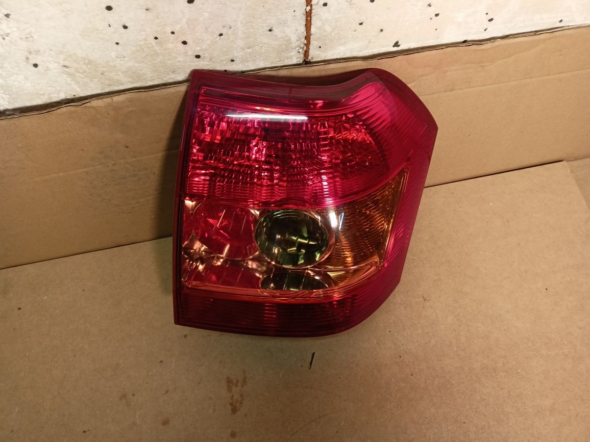 Lampa lewy tył lewa tylna toyota corolla e12 HB lift FL 04-07