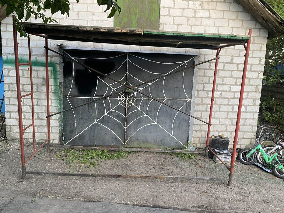 Будівельні ліса висотні роботи