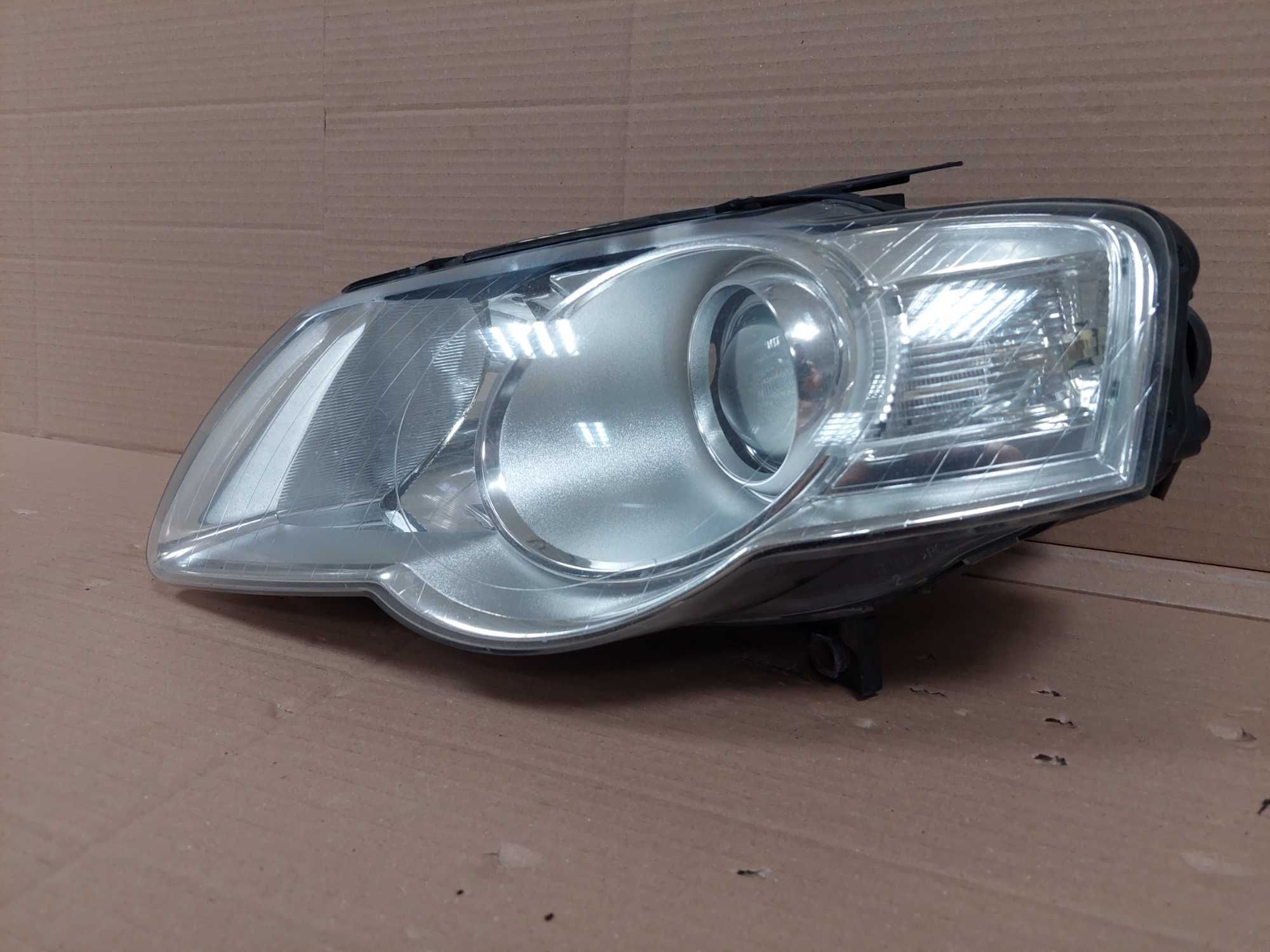 VW Passat B6 05-10r lampa przód lewa zwykła H7 VALEO EU BDB KPL