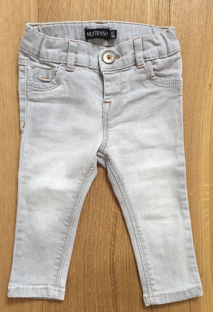 Nowe spodnie jeansy rurki r.68/74