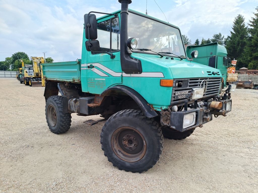 Unimog u1200 z Niemiec CIĄGNIK ROLNICZY 130PS beczka rozsiewacz Fendt