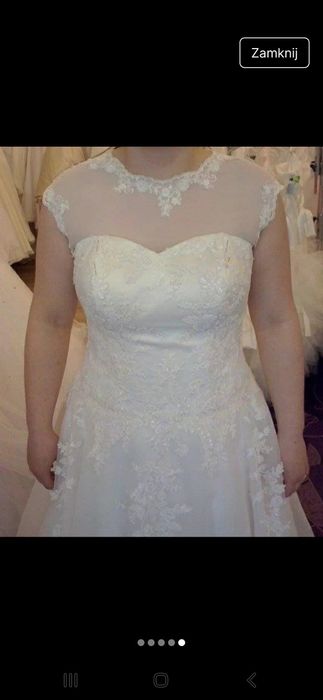 Suknia ślubna z kolekcji Elizabeth Passion, w kolorze ivory